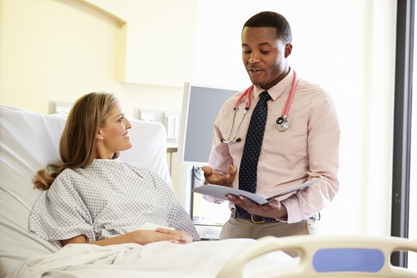 Doctor speaking to patient